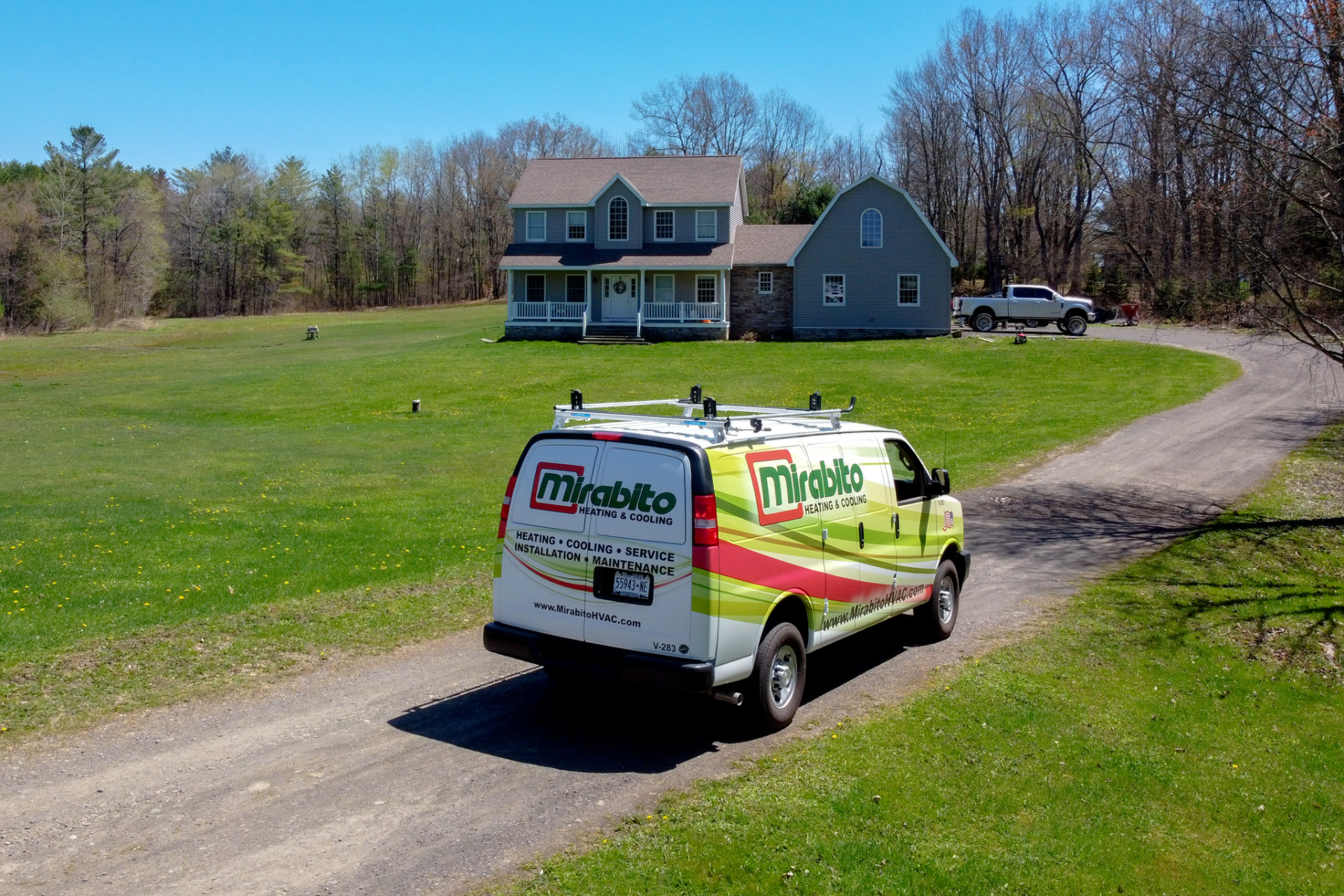 HVAC Service van in residential driveway
