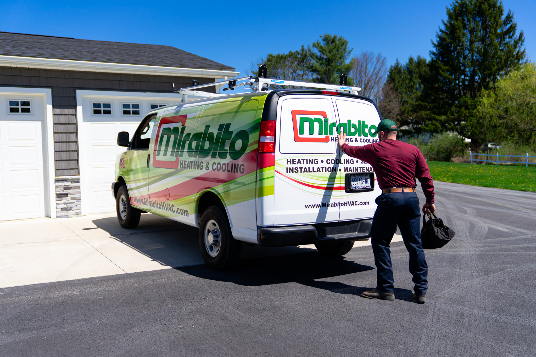 Mirabito Service tech opening the back of a service van
